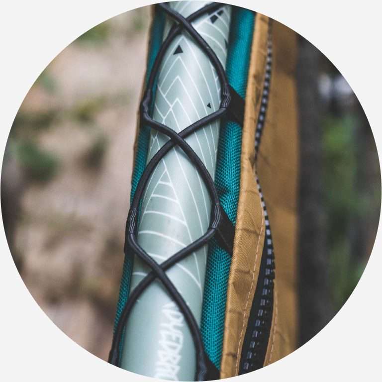 Elastic lacing on top tube spreads load and extends the life of your zip.