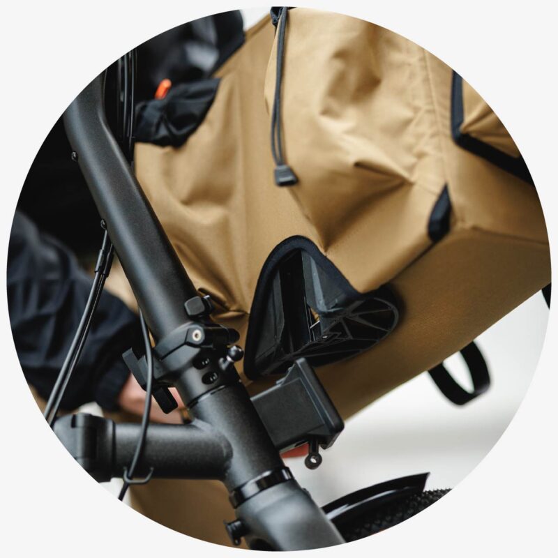 Quick and secure attachment to Brompton carrier block