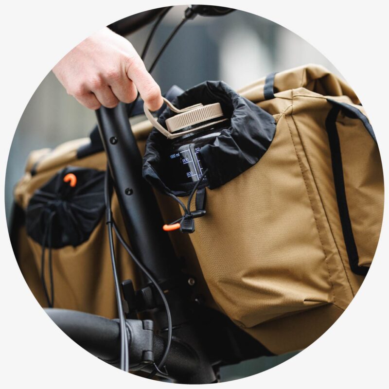 Rider facing pockets will fit bottles up to 10cm wide, such as a Nalgene