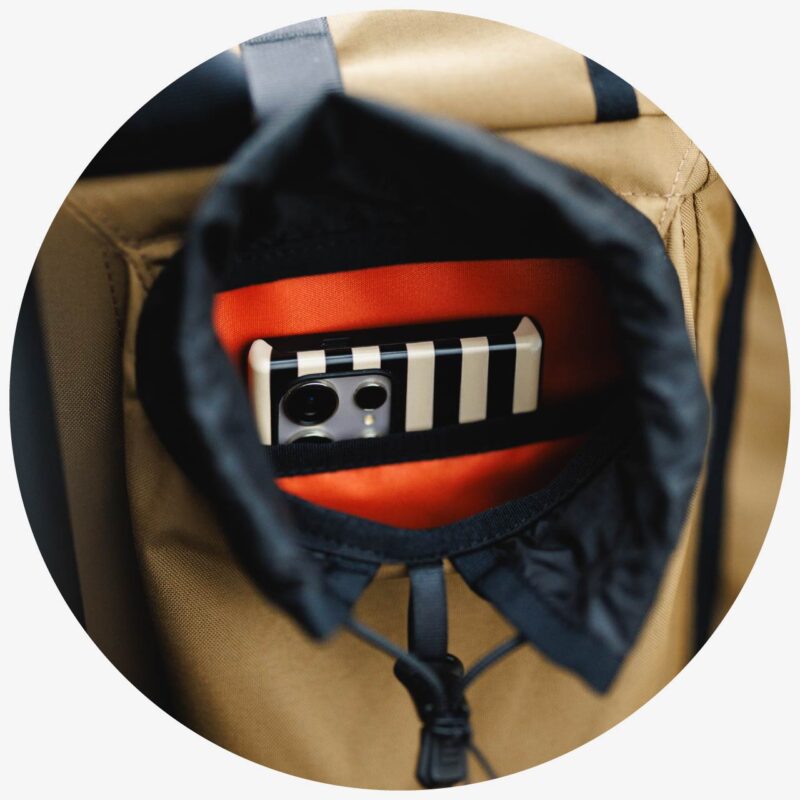 Quick access phone pocket included in right hand rider facing pocket